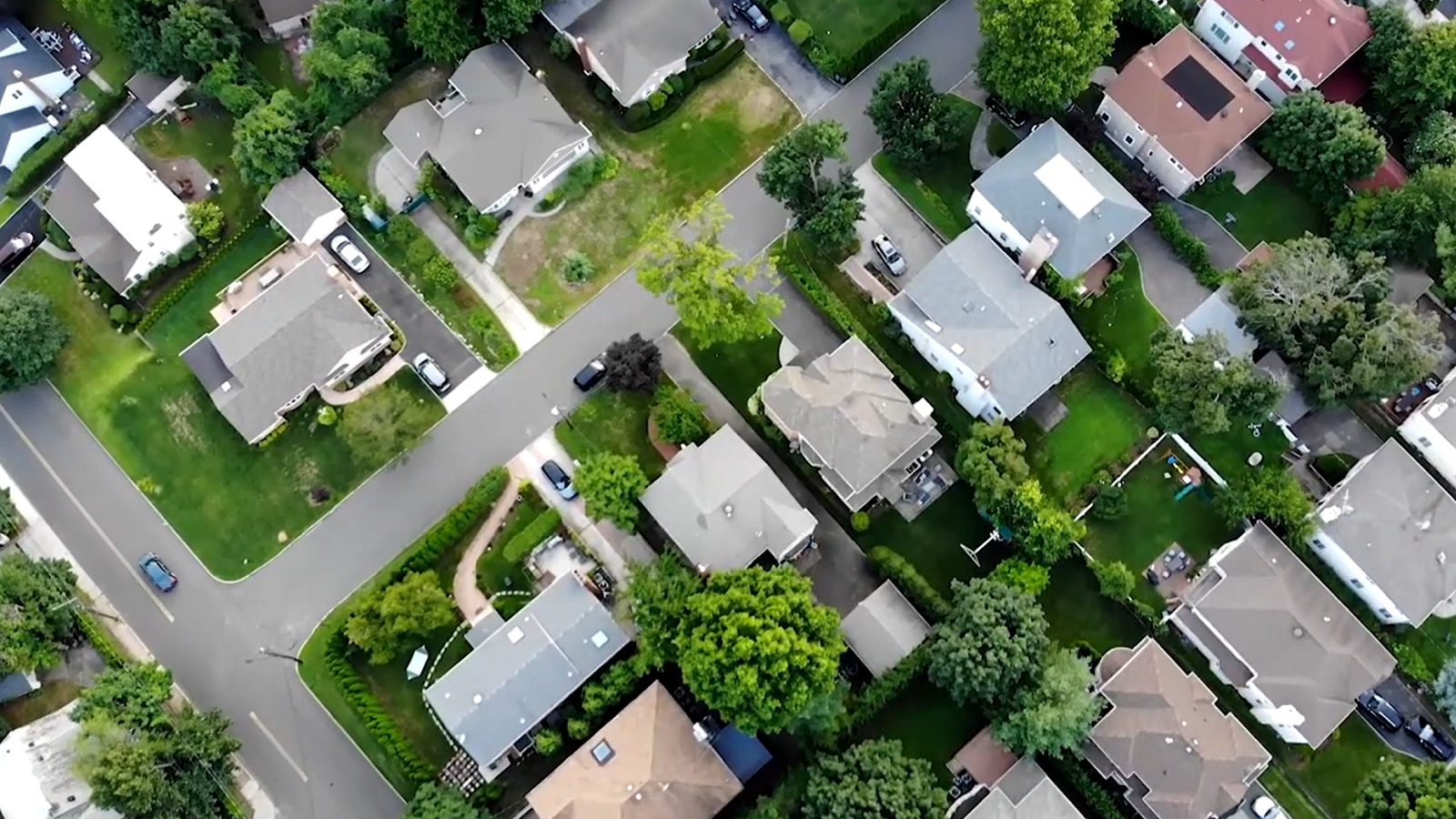 Aerial view of houses in a suburban area.